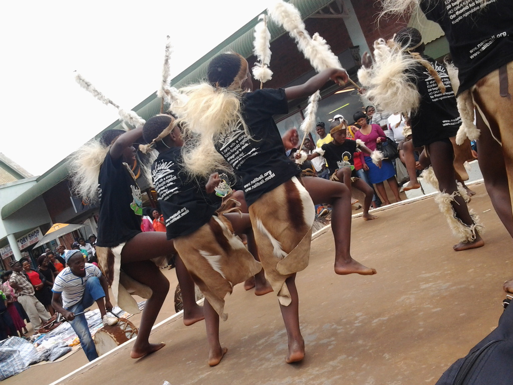 1. children dancing on stage people coming to watch