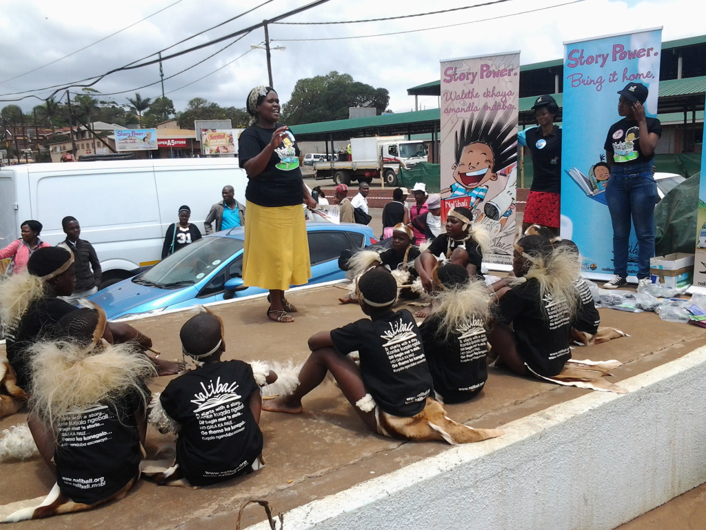 3. MRS Mthenjana telling a story to children and audience