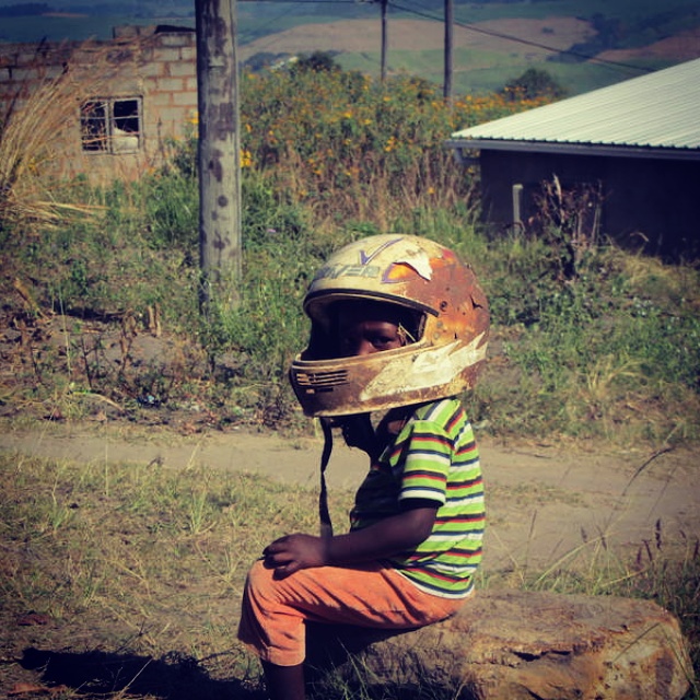 Child in a helmet in Kwazulu-Natal