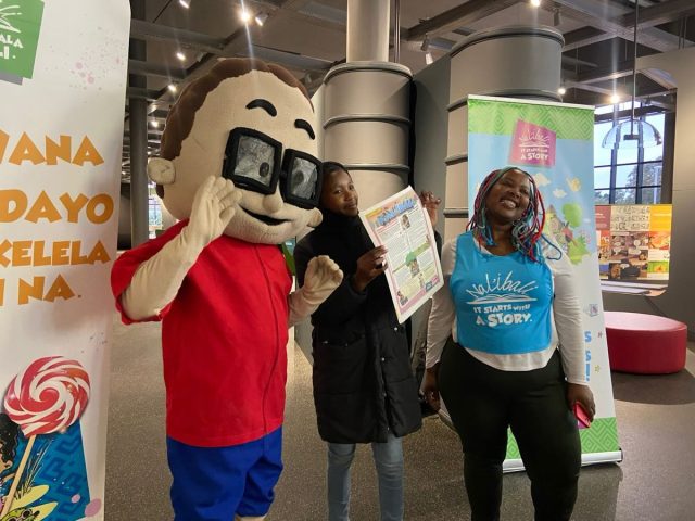 🎭 The stories have begun!

Our SEF4 Ngqushwa Team Leader, Phumeza Macwili, and our beloved mascot, Mfundo, are already bringing the magic of stories to life at the Amazwi South African Museum of Literature as part of the Department of Sport, Recreation, Arts and Culture Eastern Cape LitFest programme at the National Arts Festival in Makhanda.

Children and adults are joining in the fun through interactive storytelling, laughter, and imagination, proving that stories truly are for everyone.

Join us from 26 to 28 June and experience the joy of stories. We can’t wait to welcome you!

#Nalibali #ECLitFest #NationalArtsFestival #Storytelling #ReadingForEnjoyment